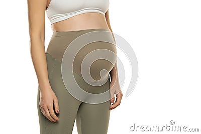 Clothes for pregnant women, gray tights with high waist isolated on white background Stock Photo