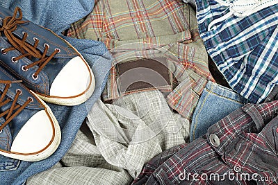 Clothes, shoes and accessories - Top view heap colorful jeans an Stock Photo