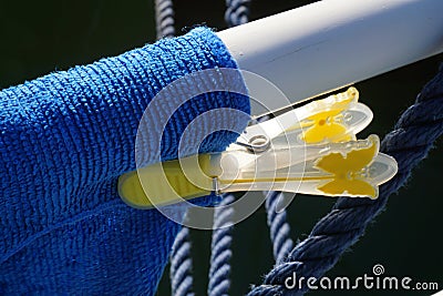 Clothespin that fixes the laundry to the washing line. Simple system that is for drying linen coming out of the washing machine. Stock Photo