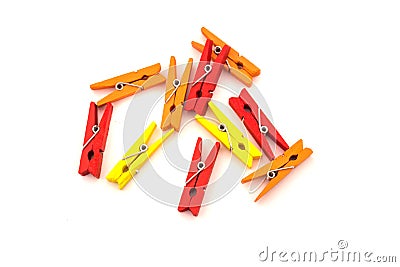 clothespins for clothes. red, yellow and orange on white background Stock Photo