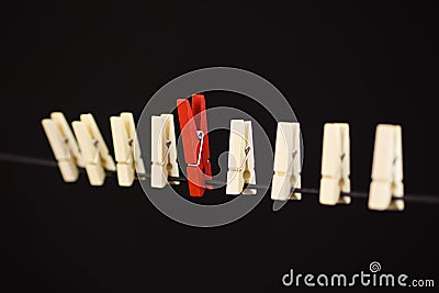 Clothespins hanging on a rope Stock Photo
