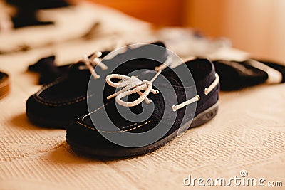 Clothing accessories for a child, suspenders, shoes and belt Stock Photo