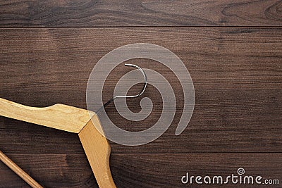 Clothing hanger on brown table Stock Photo