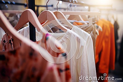 Clothing on hanger at modern shop boutique Stock Photo