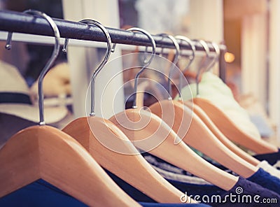 Clothing on Hangers Fashion retail Display Shop Business concept Stock Photo