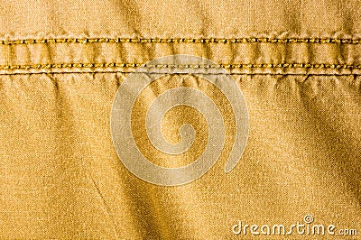 clothing items stonewashed cotton fabric texture with seams, clasps, buttons and rivets, macro Stock Photo