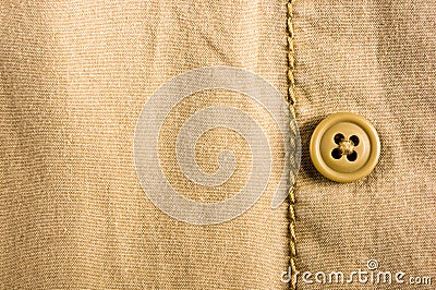 clothing items stonewashed cotton fabric texture with seams, clasps, buttons and rivets, macro Stock Photo