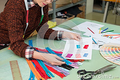 Clothing manufacturer company female employee Stock Photo