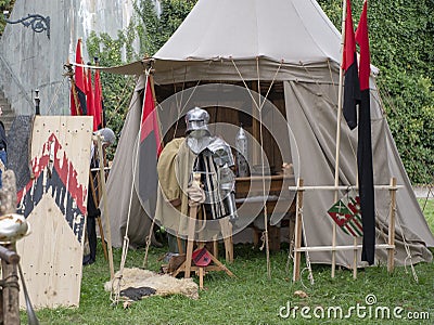 Clothing of the medieval knight. Reconstruction of historical events of the city Magdeburg, Germany. An impressive festival for Editorial Stock Photo