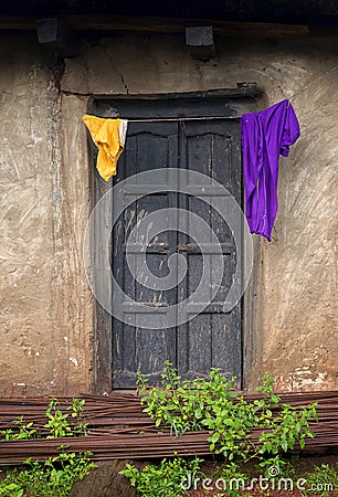 Cloths drying outside house in Nangur Village near Jagdalpur,Chhattisgarh,India Editorial Stock Photo