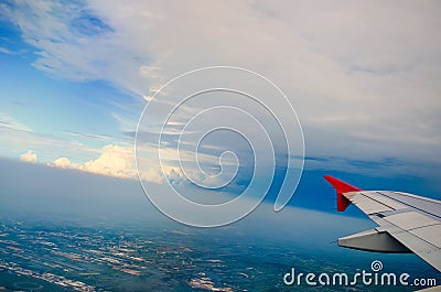 Cloud blue sky view aircraft wing airplane window Stock Photo