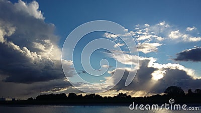 A Cloud Rabbit flees the oncoming Storm clouds! Stock Photo