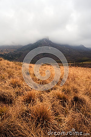 Cloud Covered Mountain Peak in Drakensburg Stock Photo