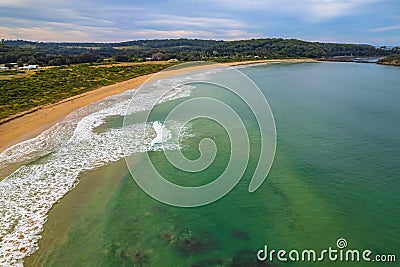 A cloud covered winters day at the beach in Tomakin Stock Photo