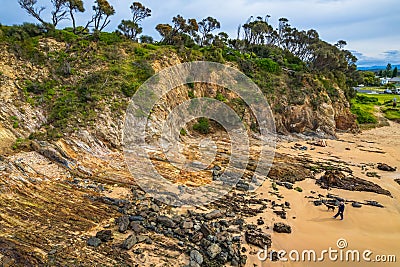A cloud covered winters day at the beach in Tomakin Stock Photo