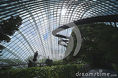 The `Cloud Forest` conservatory at the Gardens by the Bay features a 42m `Cloud Mountain` Editorial Stock Photo