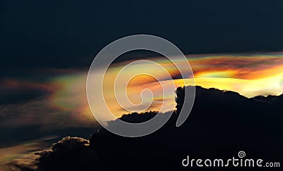 Cloud iridescence, or irisation, is a colorful light phenomenon that occurs in clouds Stock Photo