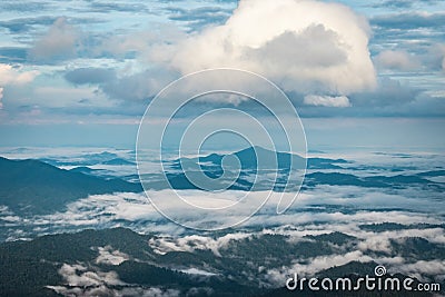 Cloud layers above mountain range Stock Photo