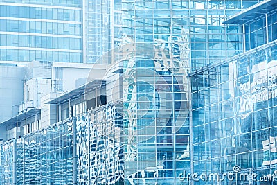 Cloud reflection in high glass offices.Blue reflection of the sk Stock Photo