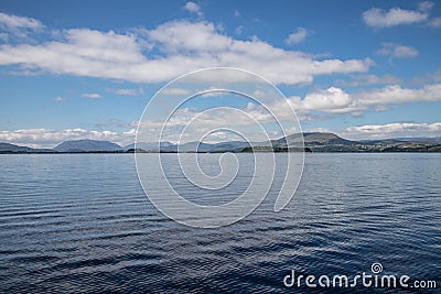 Cloud reflections, Conemara mountains and Lough Corrib Stock Photo