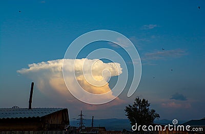 Cloud unusual shape simulating the explosion of a nuclear bomb. Stock Photo