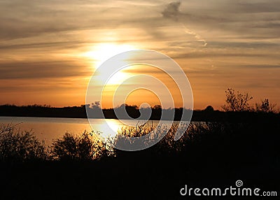 Beautiful Clouded Sunset over Grapevine Lake Stock Photo