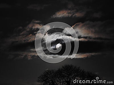 Grey clouds with moon Stock Photo