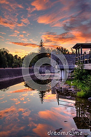 Historic Mill Ruins Reflected At Sunrise In Lindsay, Ontario, Canada Stock Photo