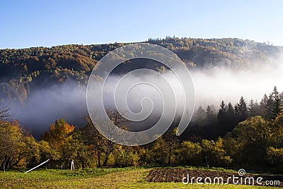 Clouds descending down the valley Stock Photo