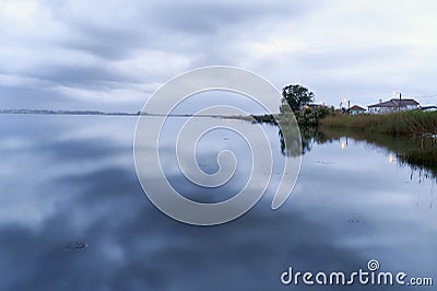 Clouds lake on winter at blue hour Stock Photo