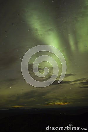 Clouds and northern lights Stock Photo
