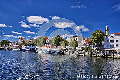 Clouds and the old lighthouse in WarnemÃ¼nde, Rostock, Germany Editorial Stock Photo