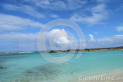 Clouds Over Clear Beach Waters Stock Photo