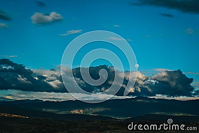 Clouds over the hills at the Tatacoa Desert, Colombia during the sunset Stock Photo