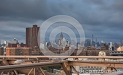 Clouds over Manhattan. View from Brooklyn Bridge to Empire States Editorial Stock Photo