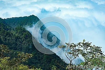 Clouds over the mountains Stock Photo