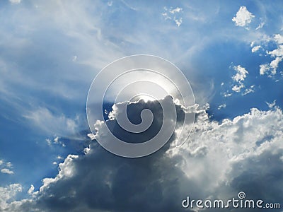 Clouds, silver lining with sunbeams, rising storm clouds Stock Photo