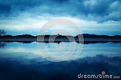 Clouds sky reflection over lake 2 Stock Photo