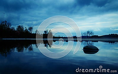 Clouds sky reflection over lake Stock Photo