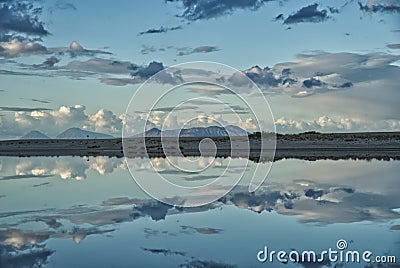 Fantastic clouds and sky reflexes Stock Photo