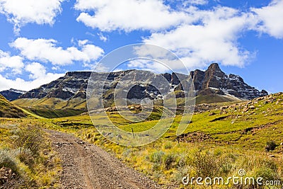 Clouds, snow and a mountain Stock Photo