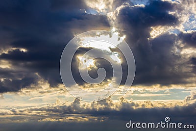 clouds and the sun breaks through Stock Photo