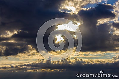 clouds and the sun breaks through Stock Photo