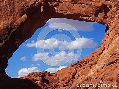 Clouds through Window Arch, Arches National Park, Utah Stock Photo