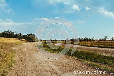 Cloudscape blue sky river lake forest sand beach daylight landscape Stock Photo