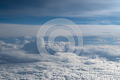 Cloudscape viewed from an airplane in flight Stock Photo