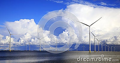 Cloudscape and wind-turbines Stock Photo