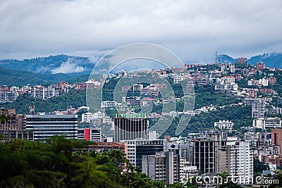 Cloudy Caracas city with the Avila at the background. Editorial Stock Photo