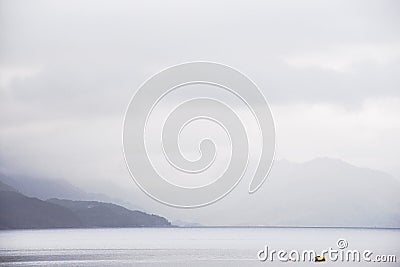 A cloudy dawn on Loch Hourn water on Isle of Skye Stock Photo