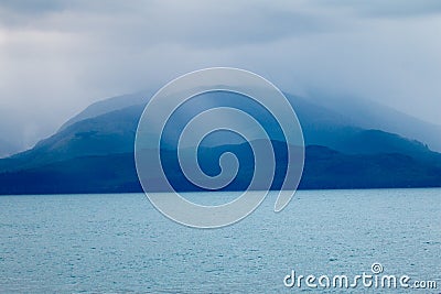 Cloudy dreamlike island Stock Photo